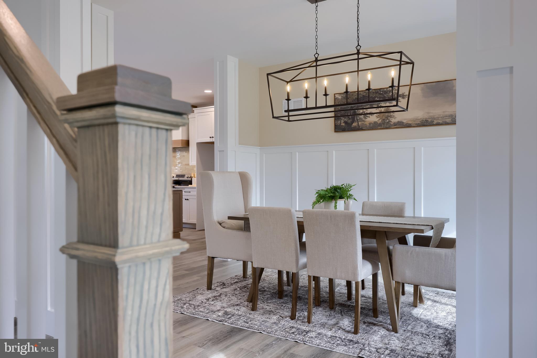 514 Woodcrest Avenue Lititz, PA 17543 - Photo 39 of 64 a view of a dining room with furniture and chandelier