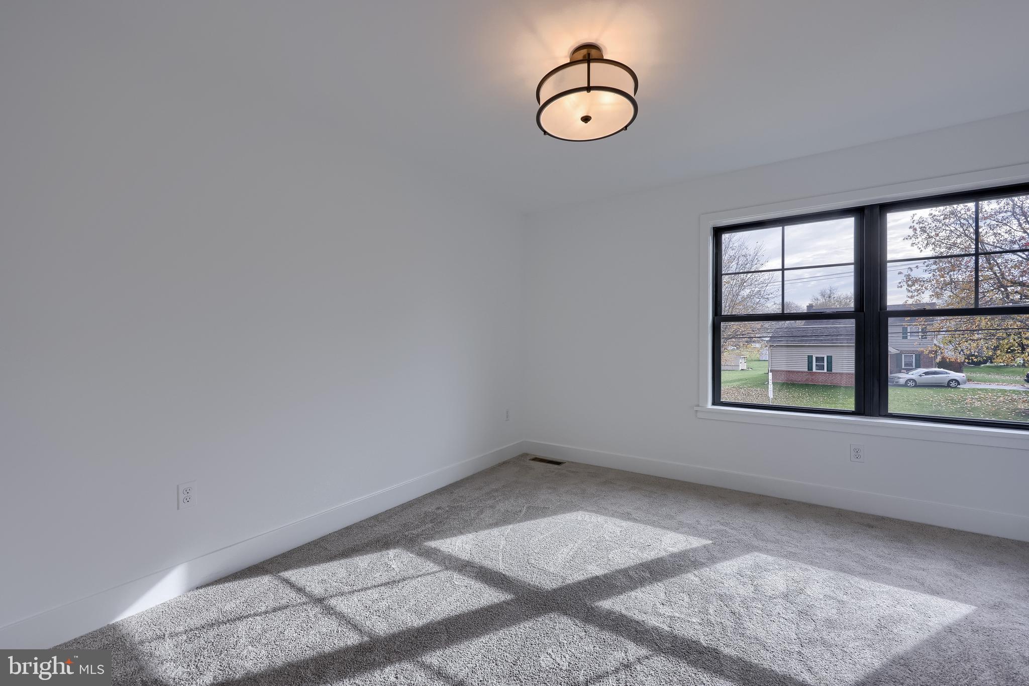 514 Woodcrest Avenue Lititz, PA 17543 - Photo 58 of 64 a view of a room with rack on the wall and window