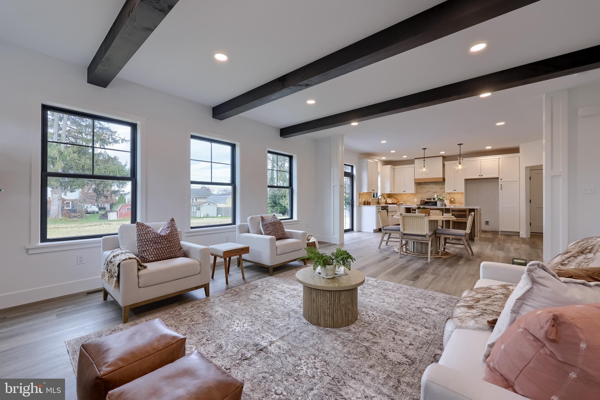 514 Woodcrest Avenue Lititz, PA 17543 - Photo 10 of 64 a living room with furniture and a large window