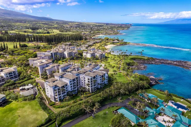 a view of a city with ocean view