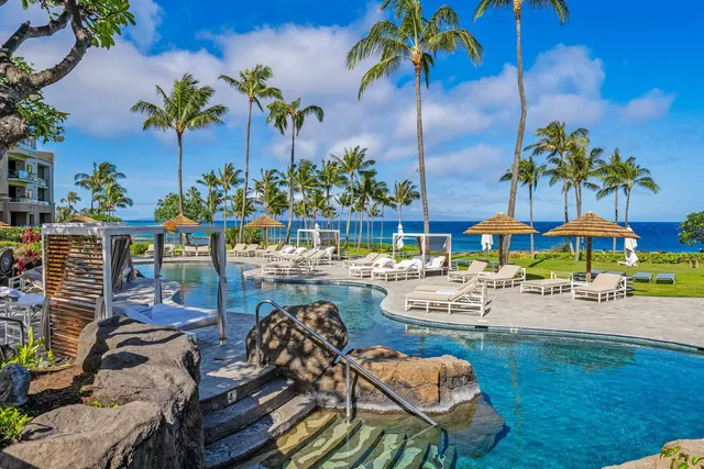 an outdoor space with patio furniture