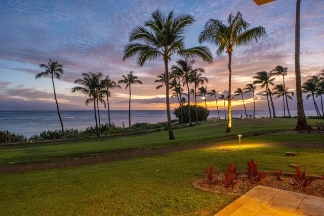 a view of a swimming pool with a table and chairs