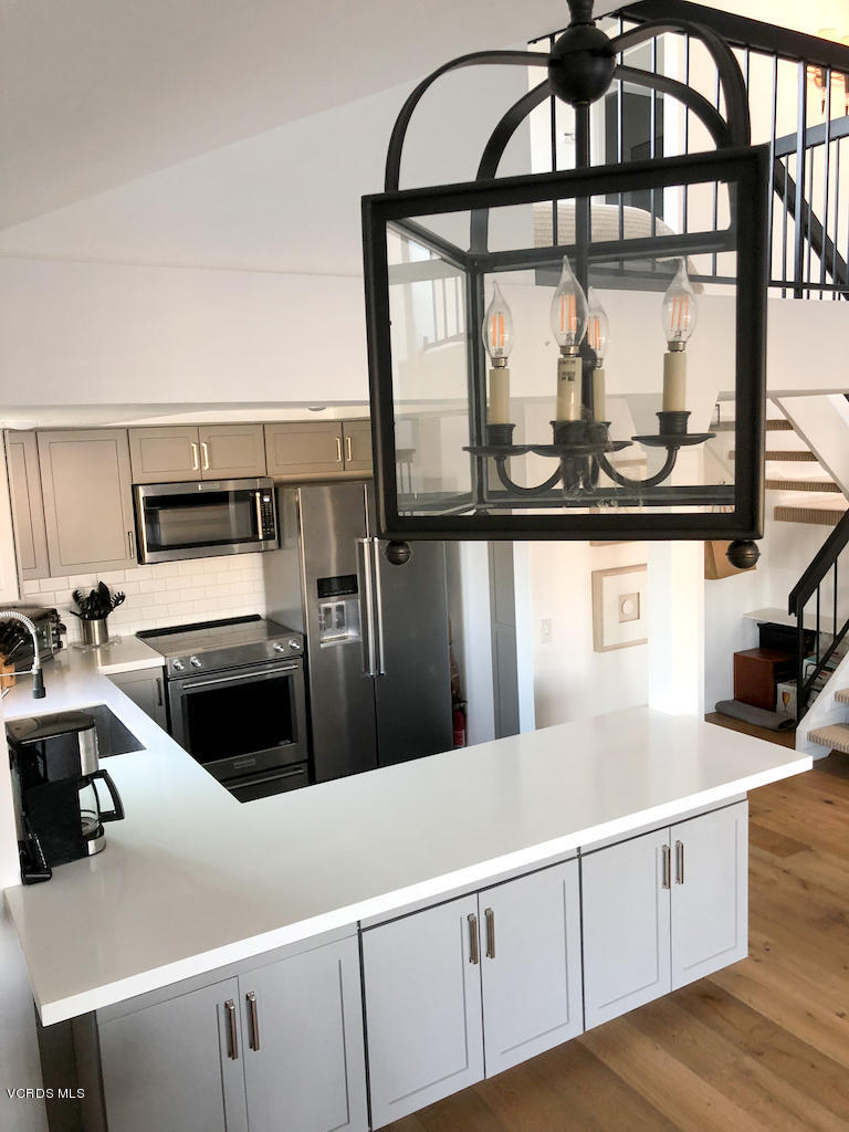 3624 Sunset Lane Oxnard, CA 93035 - Photo 11 of 26 a view of a kitchen with furniture and window