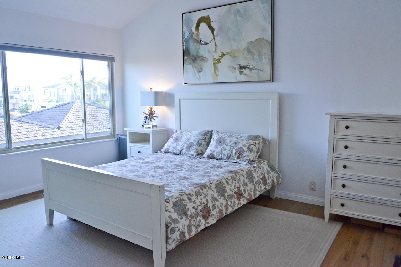 3624 Sunset Lane Oxnard, CA 93035 - Photo 16 of 26 a bed sitting in a bedroom next to a window