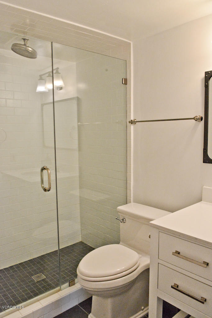 3624 Sunset Lane Oxnard, CA 93035 - Photo 18 of 26 a bathroom with a toilet a sink and shower