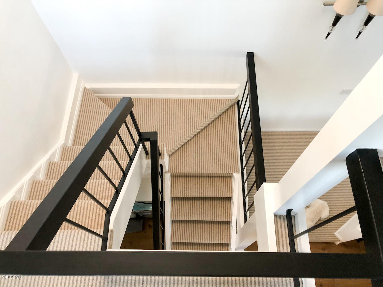3624 Sunset Lane Oxnard, CA 93035 - Photo 20 of 26 a view of staircase with white walls and a window