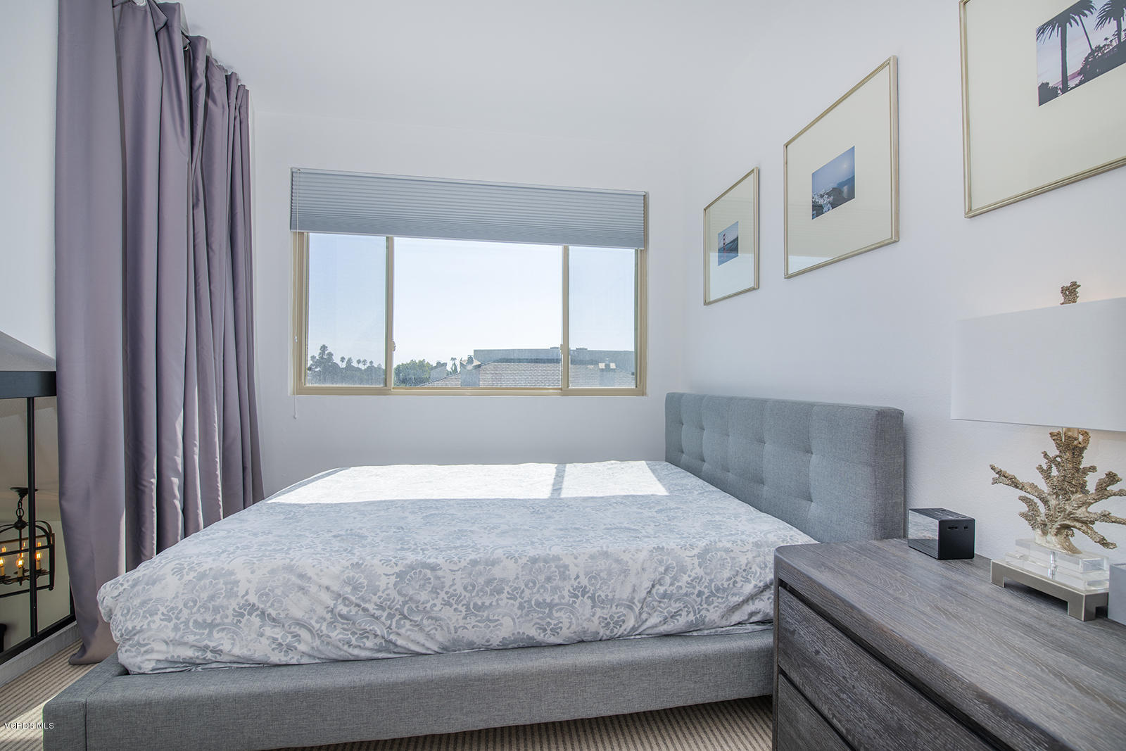 3624 Sunset Lane Oxnard, CA 93035 - Photo 22 of 26 a bedroom with a large bed and a window