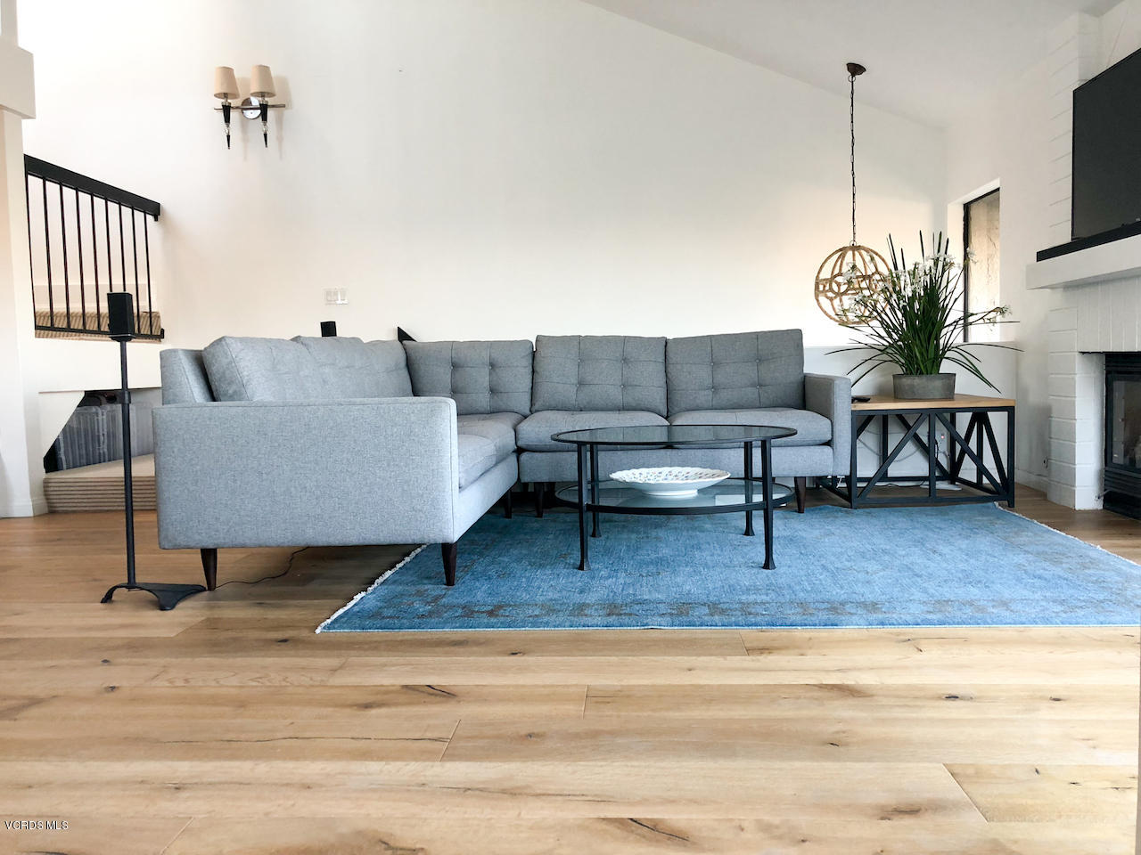 3624 Sunset Lane Oxnard, CA 93035 - Photo 5 of 26 a living room with furniture and a wooden floor