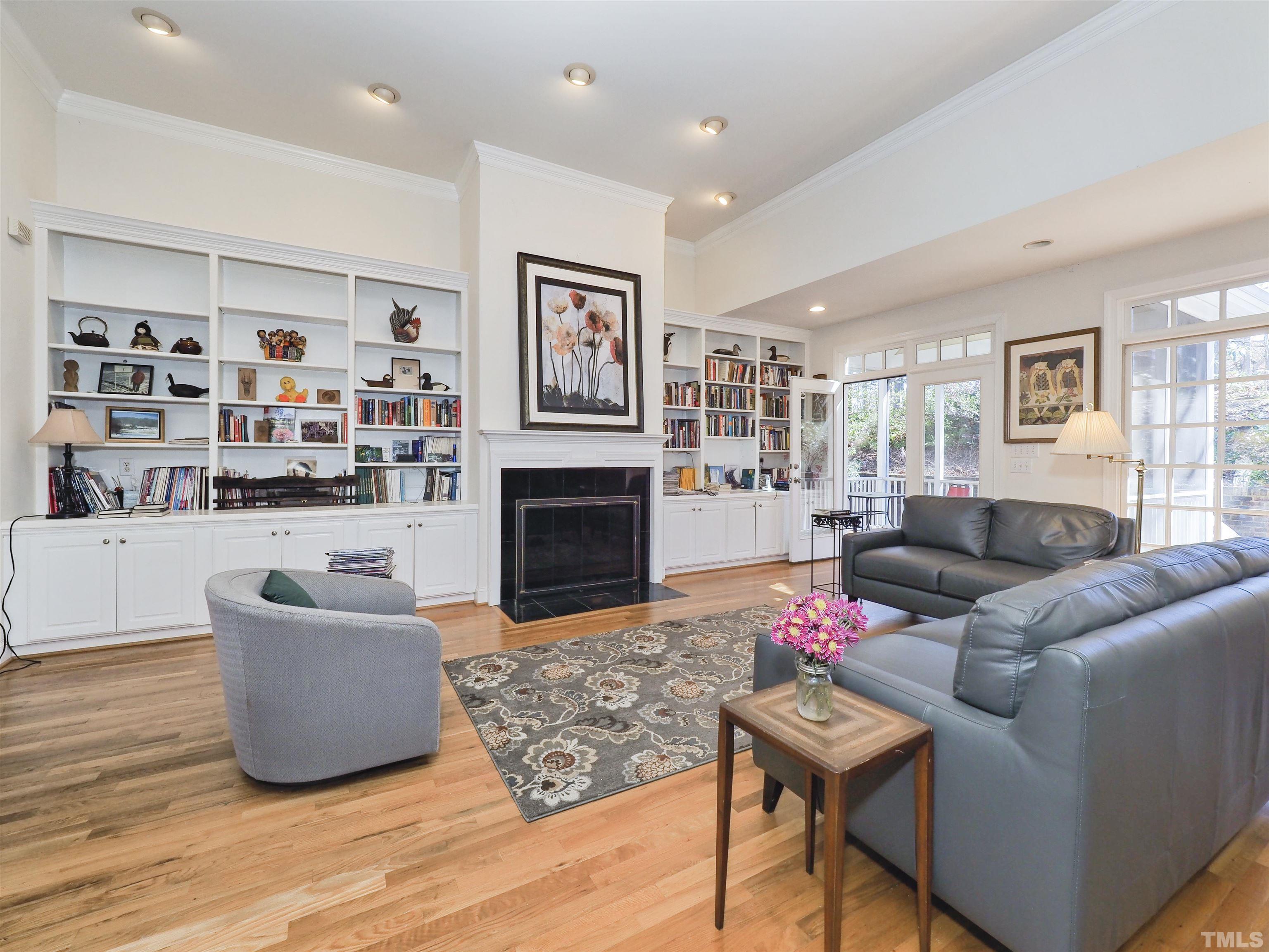 42 Cheswick Place Durham, NC 27707 - Photo 12 of 27 a living room with furniture and a fireplace