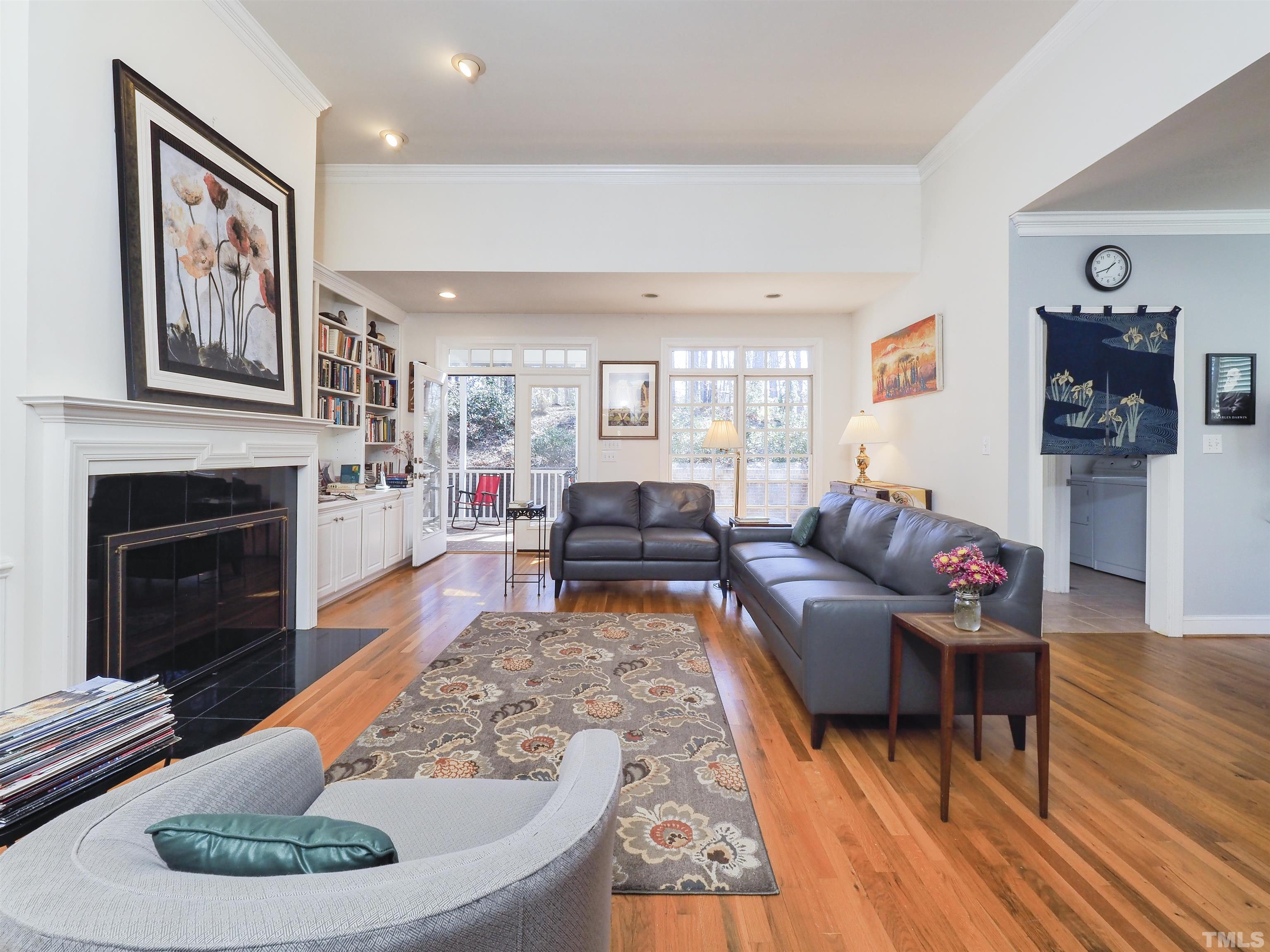 42 Cheswick Place Durham, NC 27707 - Photo 14 of 27 a living room with furniture and a fireplace