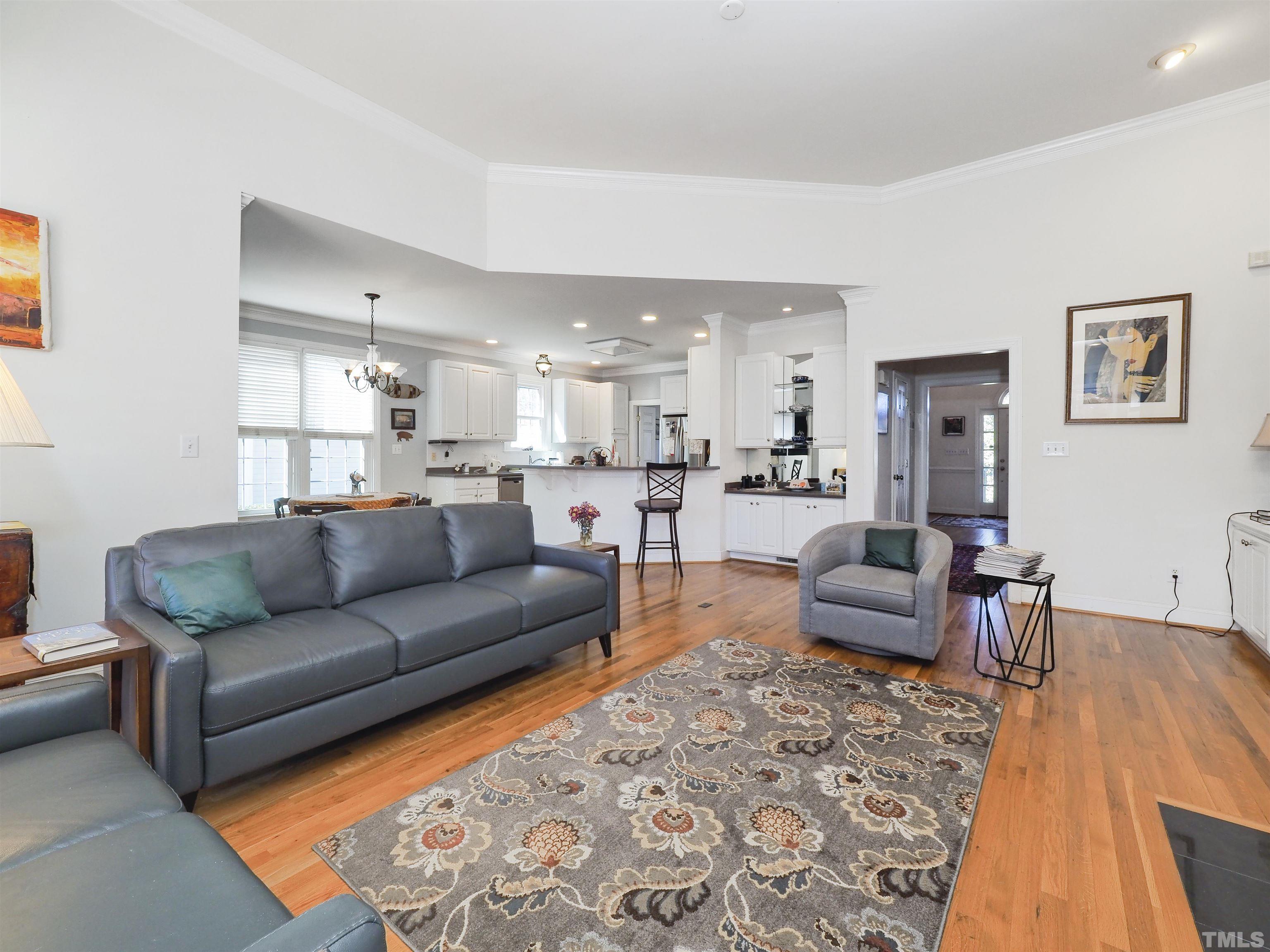 42 Cheswick Place Durham, NC 27707 - Photo 17 of 27 a living room with furniture and kitchen view