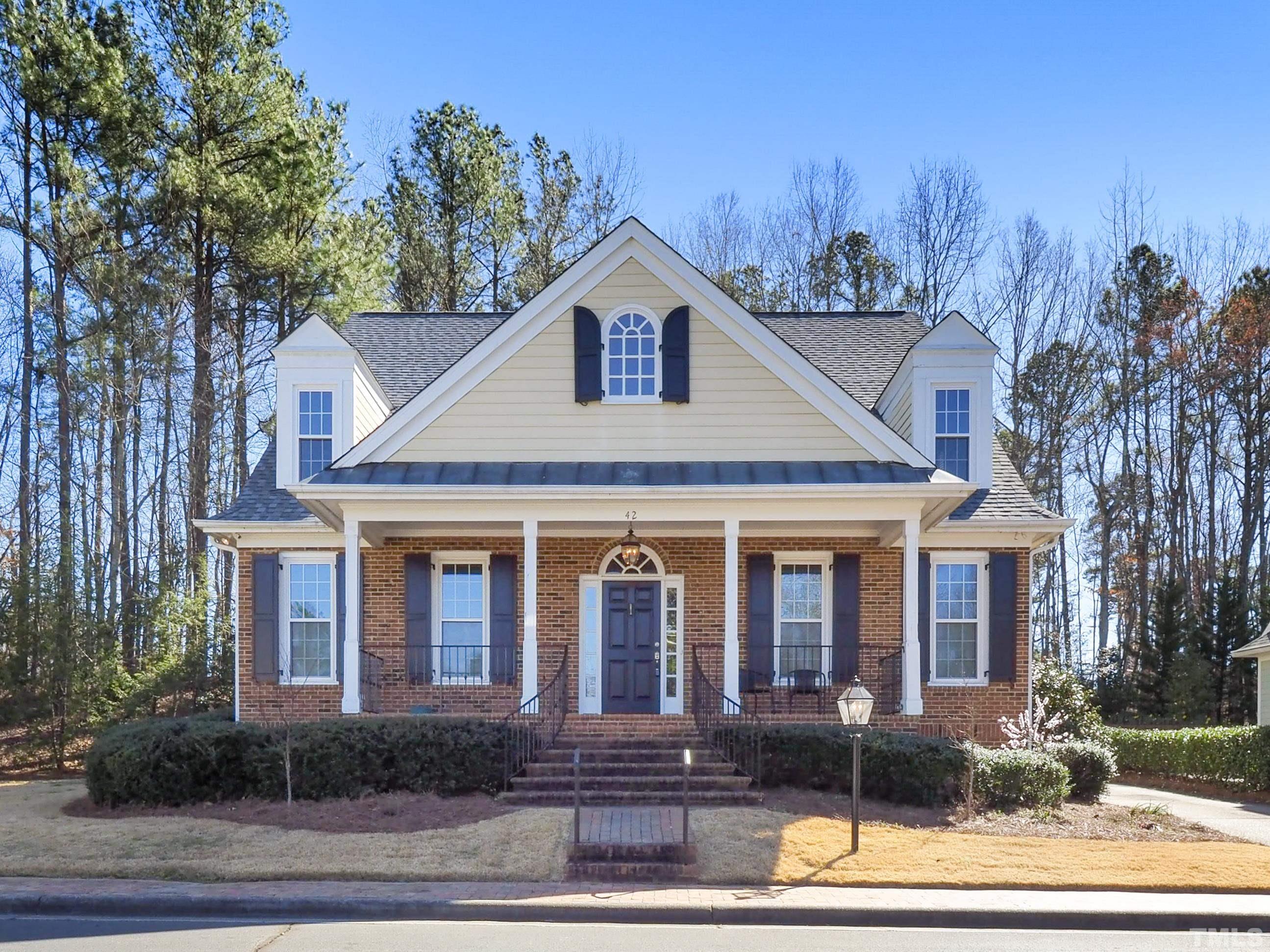 42 Cheswick Place Durham, NC 27707 - Photo 2 of 27 a front view of a house with a yard
