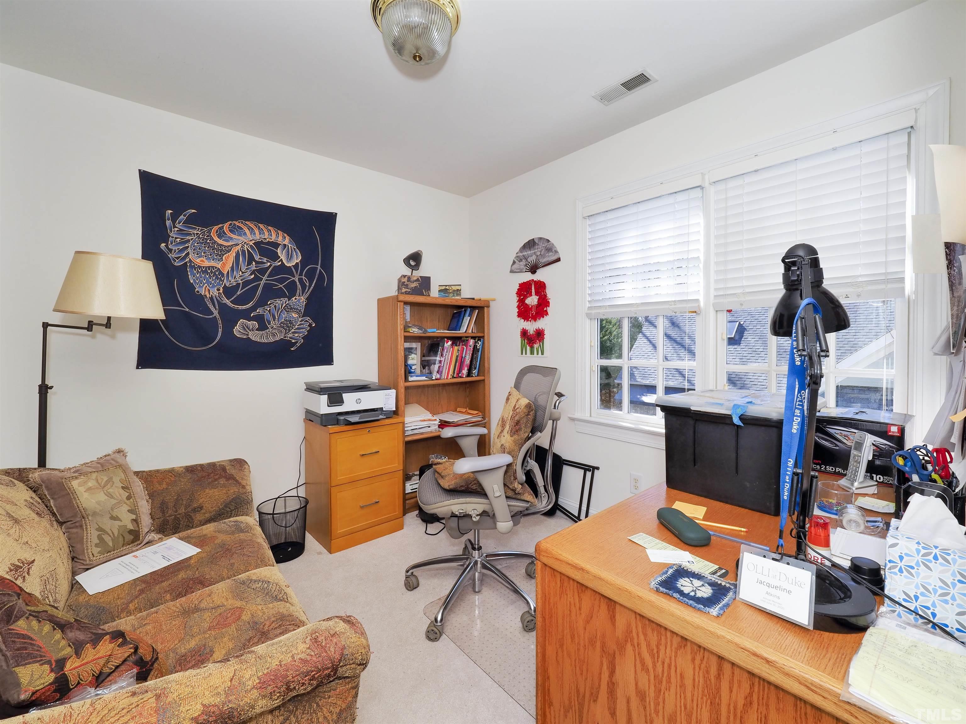 42 Cheswick Place Durham, NC 27707 - Photo 24 of 27 a workspace with furniture and window