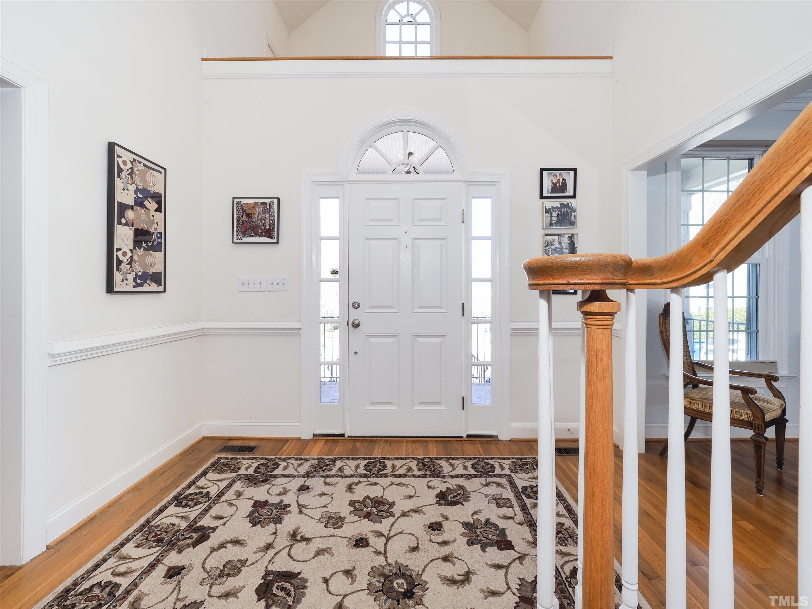 42 Cheswick Place Durham, NC 27707 - Photo 4 of 27 a front view of a house with wooden floor