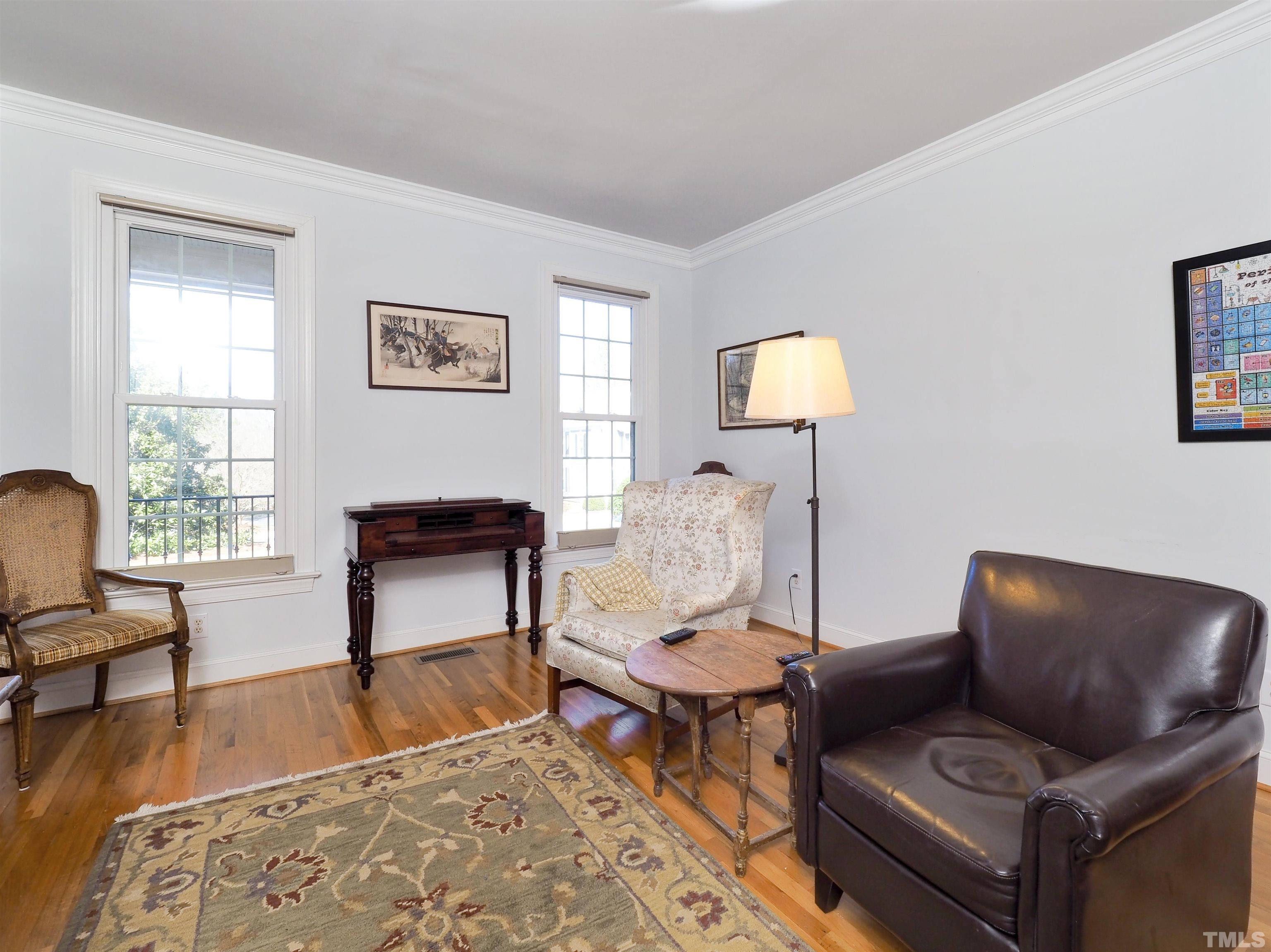 42 Cheswick Place Durham, NC 27707 - Photo 5 of 27 a living room with furniture and a window