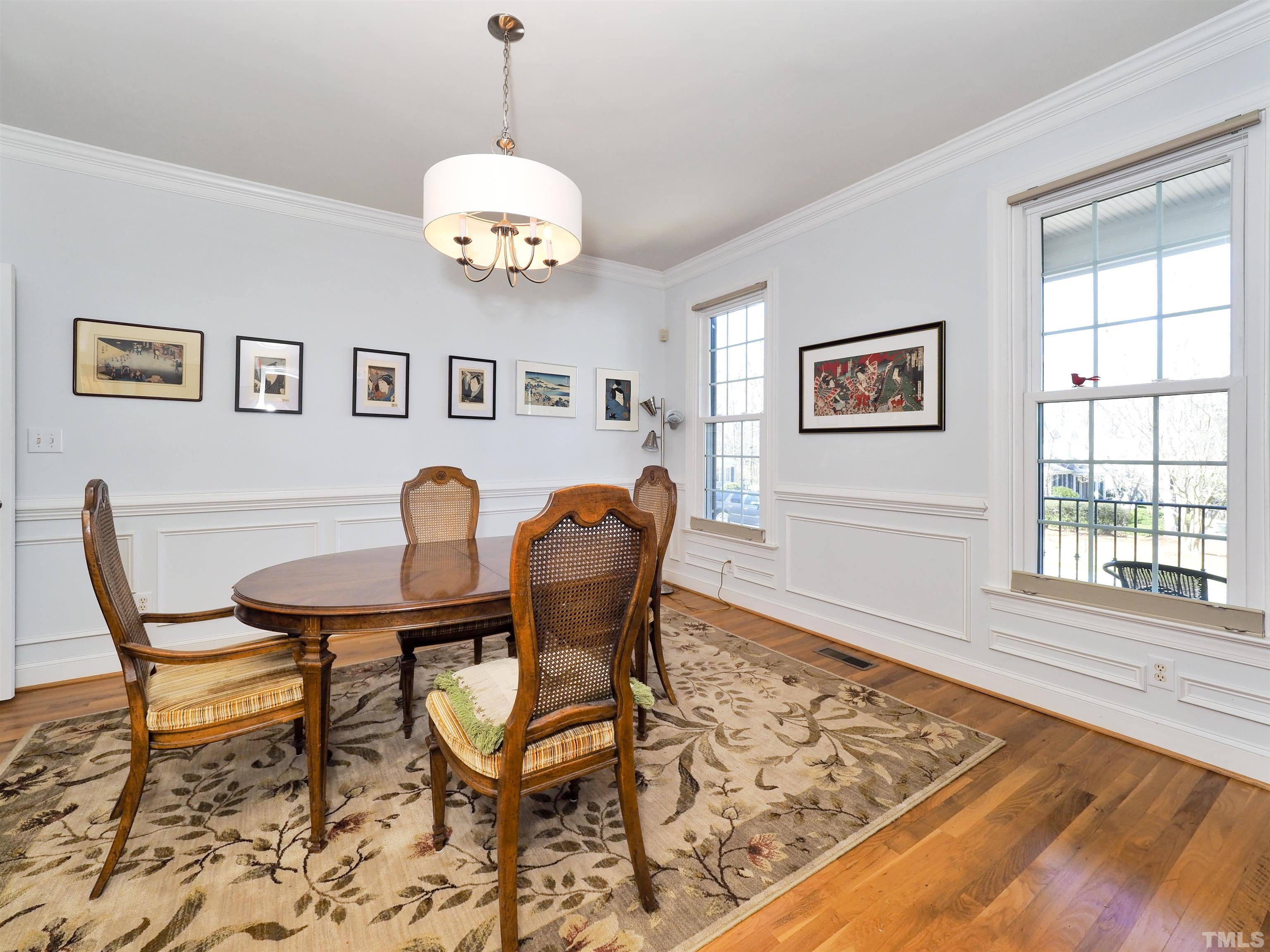 42 Cheswick Place Durham, NC 27707 - Photo 7 of 27 a view of a dining room with furniture and chandelier