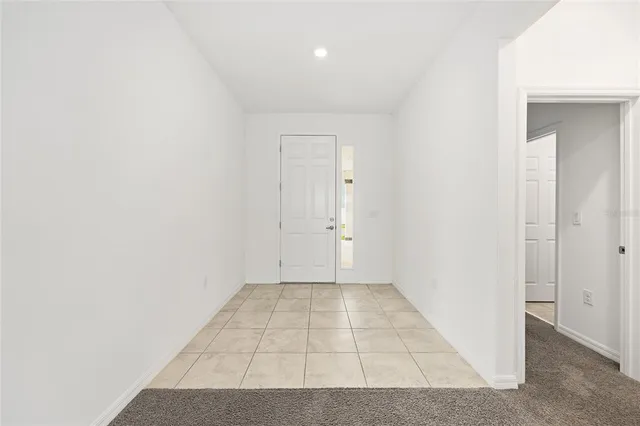a kitchen with stainless steel appliances granite countertop a sink and a stove