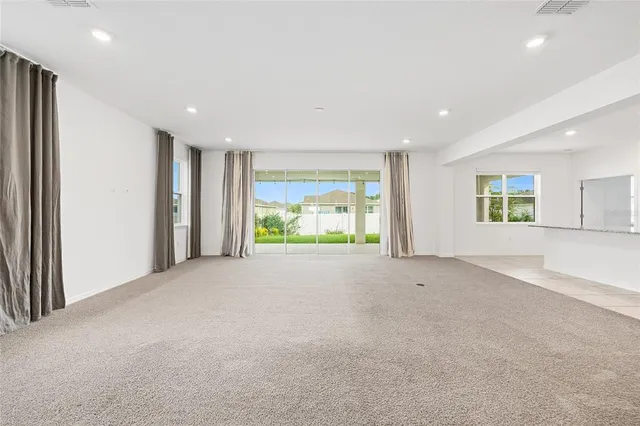 a kitchen with stainless steel appliances granite countertop a stove and a sink
