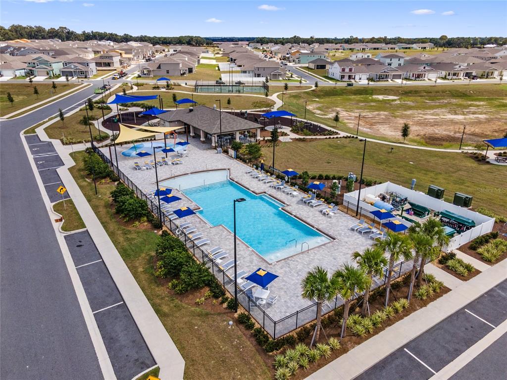 7635 Southwest 64th St Road Ocala, FL 34474 - Photo 2 of 86 a view of a city with an ocean