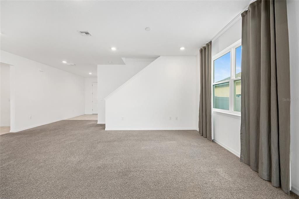7635 Southwest 64th St Road Ocala, FL 34474 - Photo 23 of 86 a view of an empty room with a window