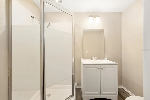 a view of a house with a yard and table and chair