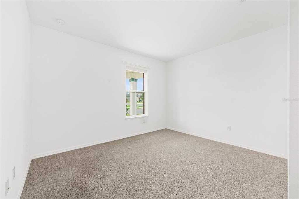 7635 Southwest 64th St Road Ocala, FL 34474 - Photo 39 of 86 an empty room with windows