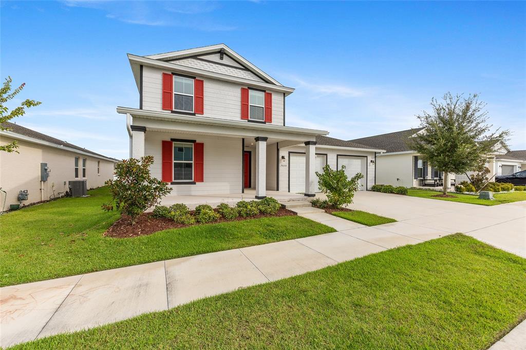 7635 Southwest 64th St Road Ocala, FL 34474 - Photo 5 of 86 a front view of house with yard and green space