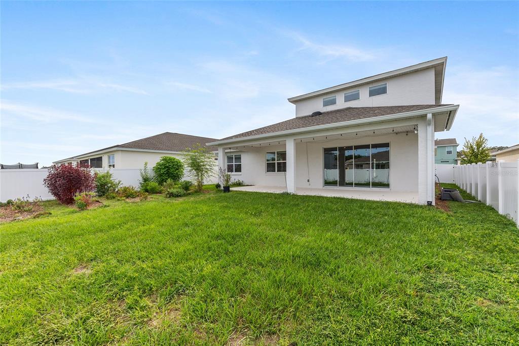 7635 Southwest 64th St Road Ocala, FL 34474 - Photo 64 of 86 a front view of house with yard and green space