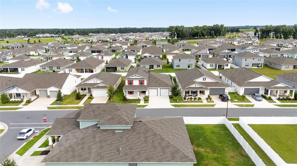 7635 Southwest 64th St Road Ocala, FL 34474 - Photo 73 of 86 an aerial view of residential houses with outdoor space and parking