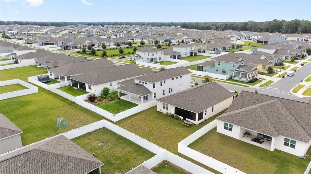 7635 Southwest 64th St Road Ocala, FL 34474 - Photo 82 of 86 an aerial view of residential houses with outdoor space and river