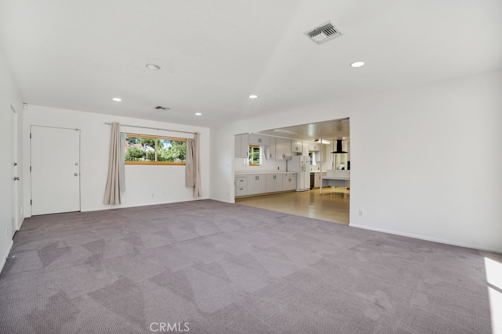 18912 Blackhawk Street Porter Ranch, CA 91326 - Photo 12 of 48 a view of empty room with a fireplace