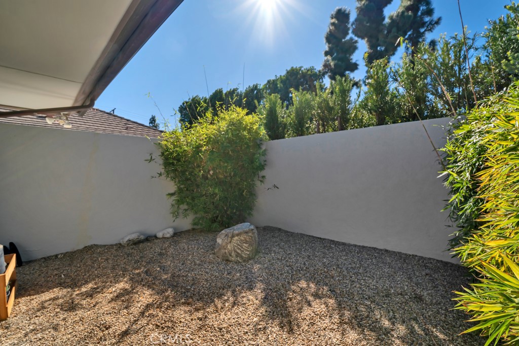 18912 Blackhawk Street Porter Ranch, CA 91326 - Photo 22 of 48 a backyard of a house