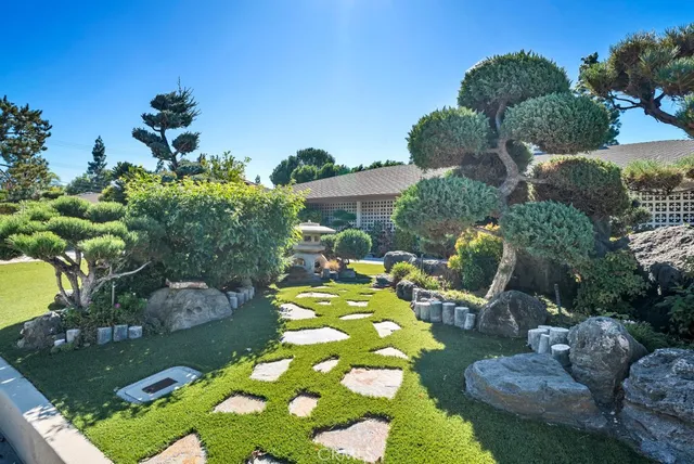 a view of a swimming pool with a patio