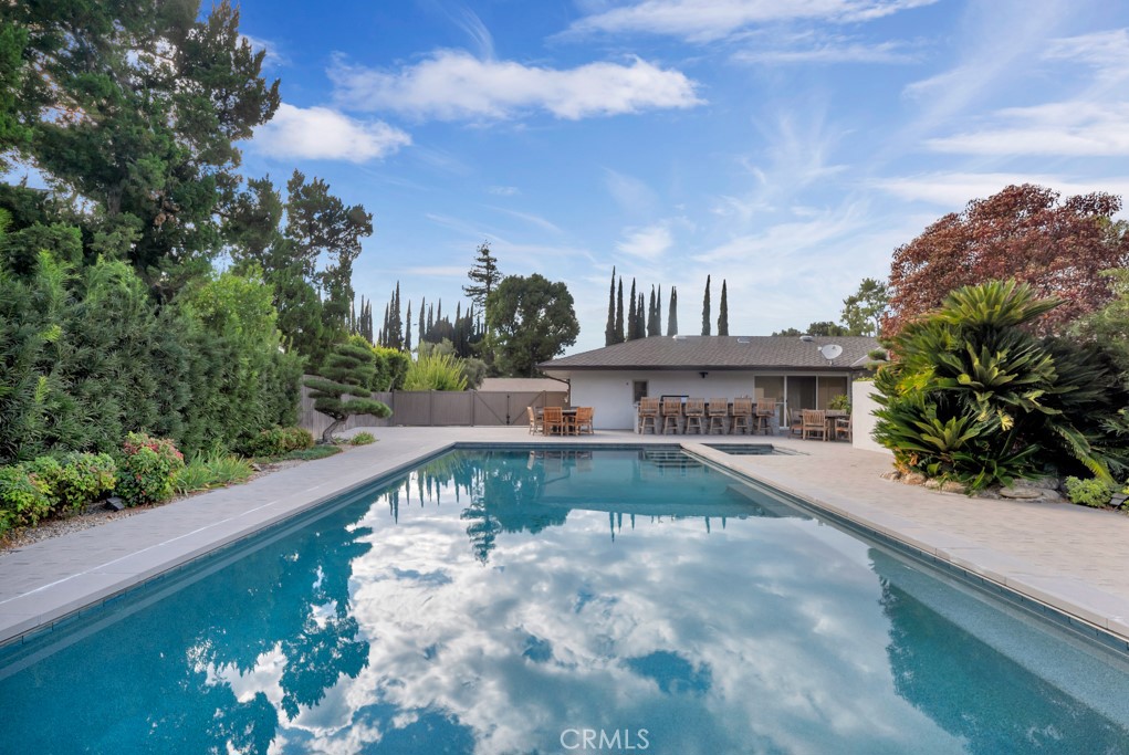 18912 Blackhawk Street Porter Ranch, CA 91326 - Photo 39 of 48 a view of a swimming pool with a patio