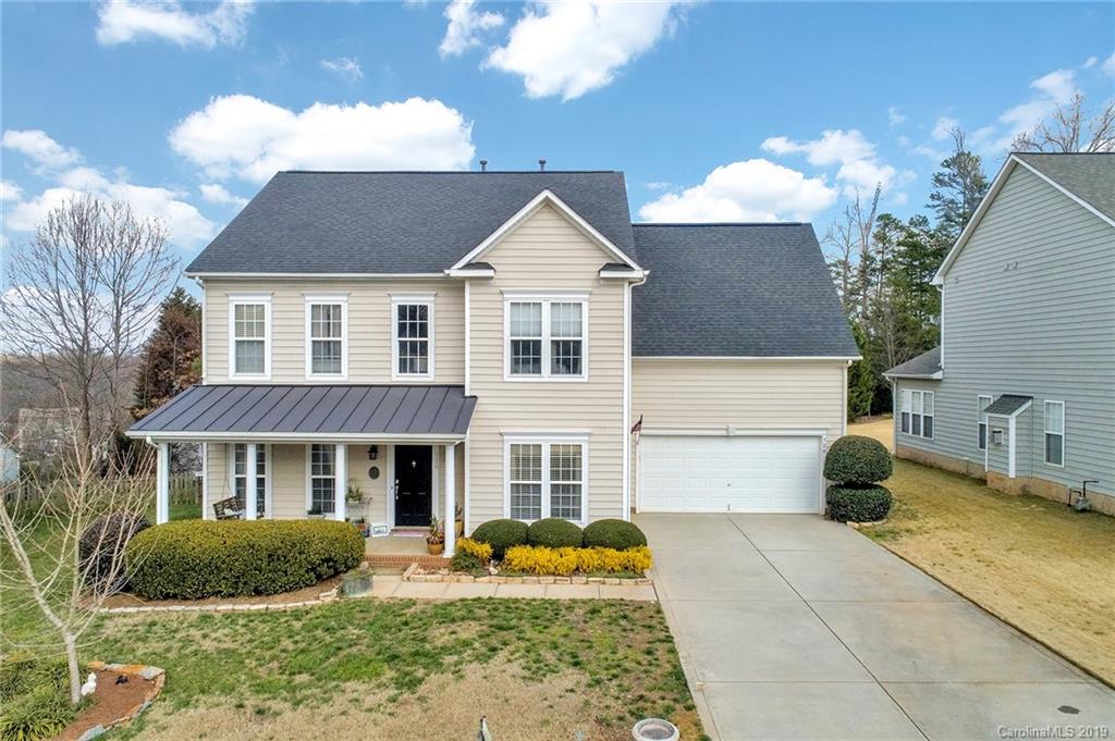 720 Warwick Way Fort Mill, SC 29708 - Photo 1 of 36 a front view of a house with garden