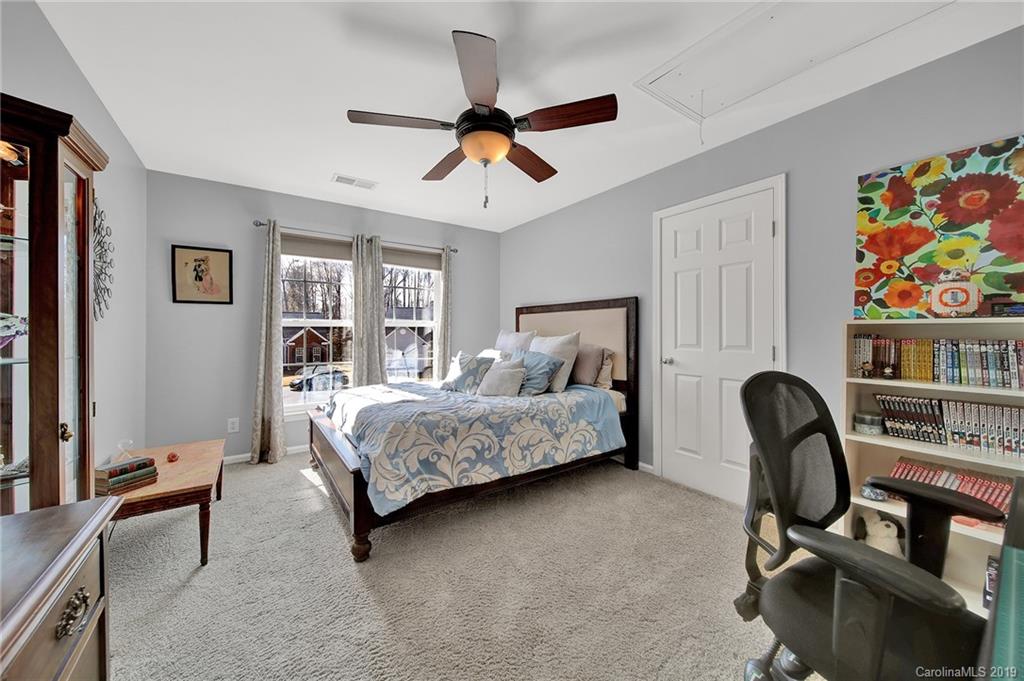 720 Warwick Way Fort Mill, SC 29708 - Photo 19 of 36 a bedroom with furniture and a window