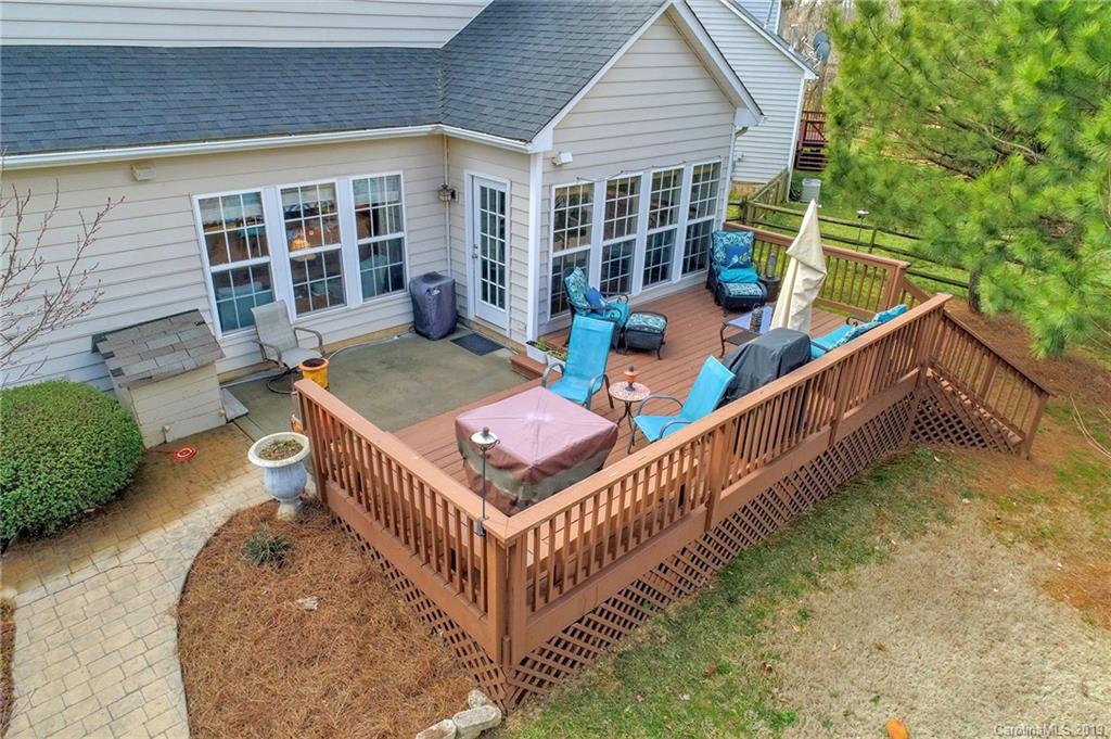 720 Warwick Way Fort Mill, SC 29708 - Photo 34 of 36 a view of a balcony with two chairs and a table