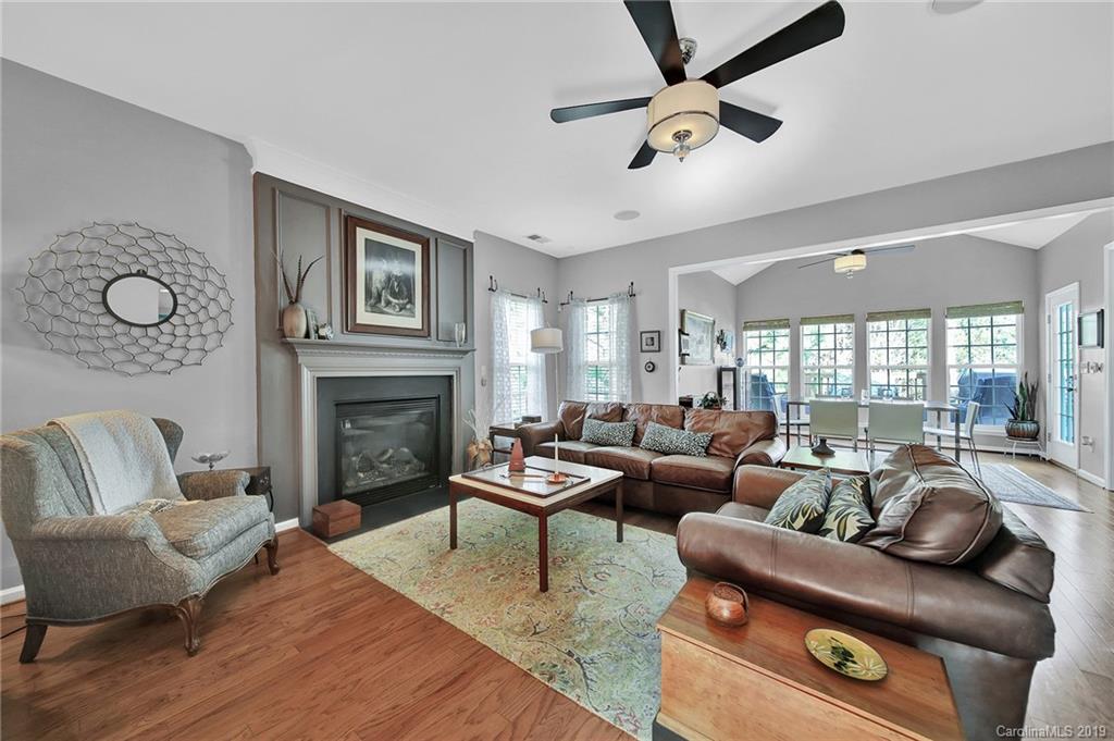 720 Warwick Way Fort Mill, SC 29708 - Photo 6 of 36 a living room with furniture and a fireplace