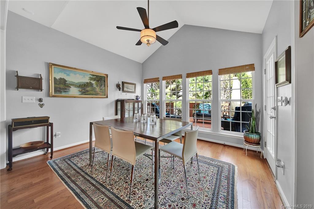 720 Warwick Way Fort Mill, SC 29708 - Photo 9 of 36 a workspace with wooden floor and a rug