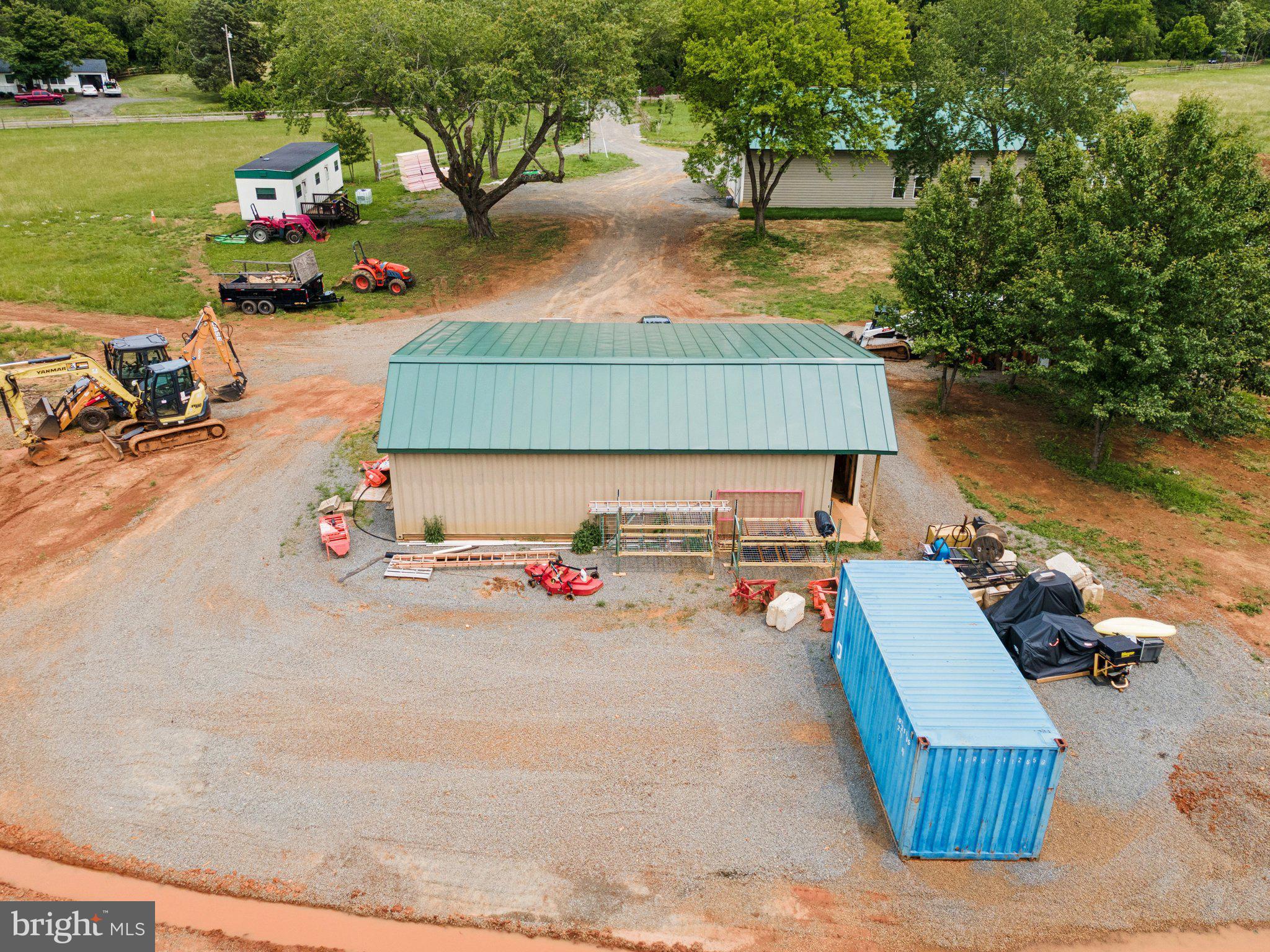 7285 Opal Road Warrenton, VA 20186 - Photo 34 of 34 an aerial view of a house with outdoor space swimming pool and lake view