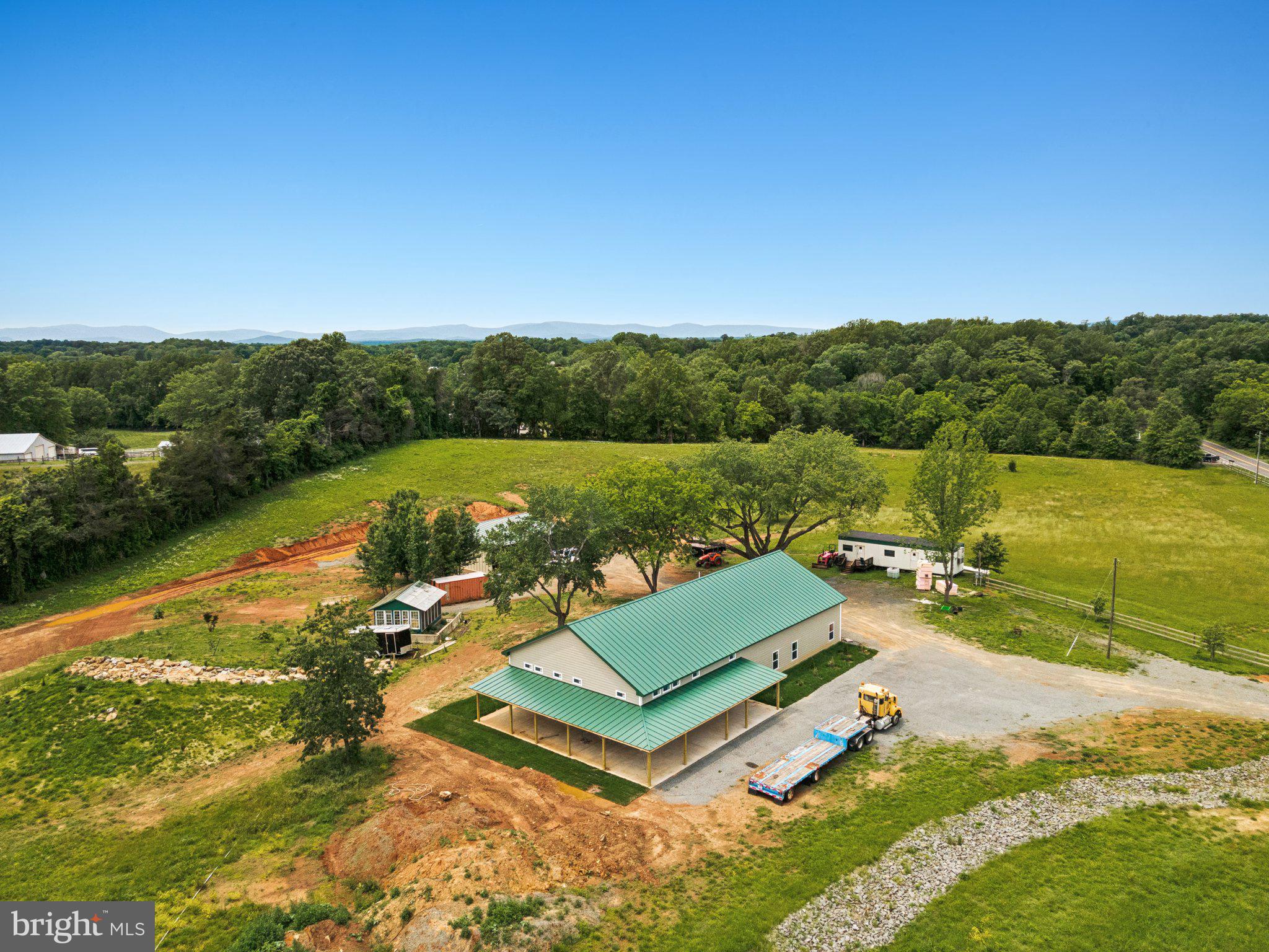 7285 Opal Road Warrenton, VA 20186 - Photo 4 of 34 a view of a swimming pool with lounge chair
