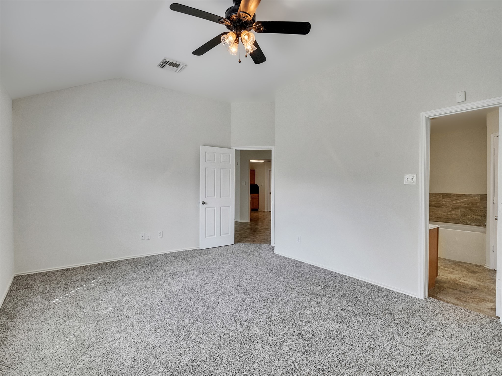 13431 Rural Oak Street Houston, TX 77034 - Photo 14 of 24 a view of a livingroom with a ceiling fan and entryway