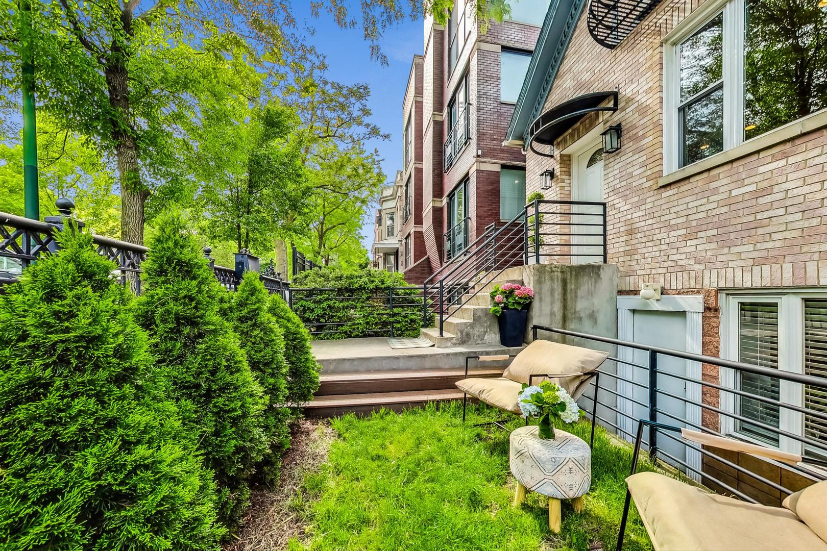 2320 West Belden Avenue Chicago, IL 60647 - Photo 32 of 36 a view of a chair and table in backyard of the house