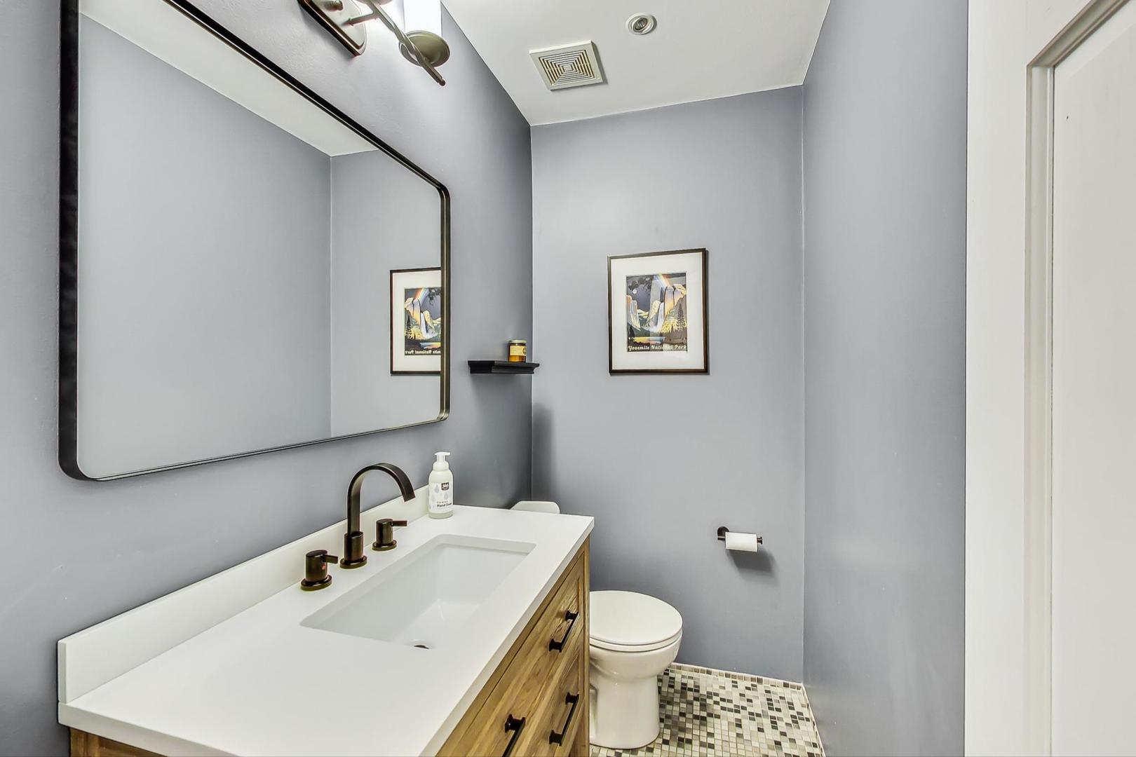 2320 West Belden Avenue Chicago, IL 60647 - Photo 6 of 36 a bathroom with a sink and a toilet