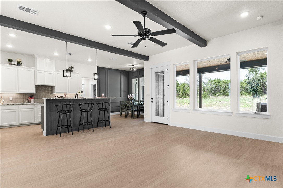 3025 Millhouse Road Copperas Cove, TX 76522 - Photo 4 of 38 a large kitchen with a table and chairs