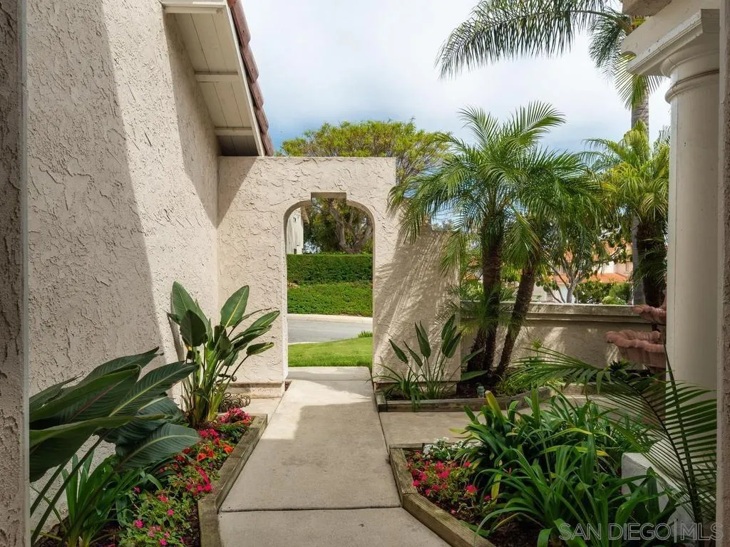 1981 Avenida Joaquin Encinitas, CA 92024 - Photo 4 of 51 a view of a backyard with palm trees