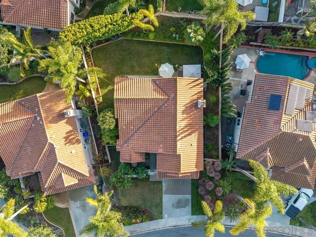 1981 Avenida Joaquin Encinitas, CA 92024 - Photo 44 of 51 an aerial view of a house with a yard and large trees