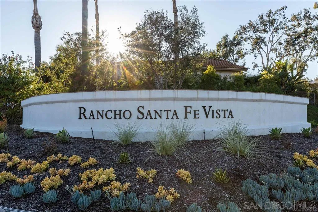 1981 Avenida Joaquin Encinitas, CA 92024 - Photo 45 of 51 a sign that is sitting in front of flowers