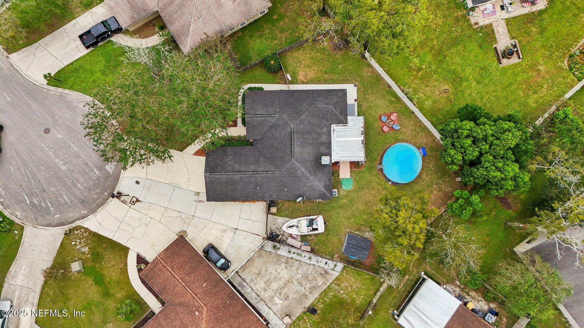 8053 Queensferry Lane Jacksonville, FL 32244 - Photo 40 of 45 an aerial view of a house with a swimming pool