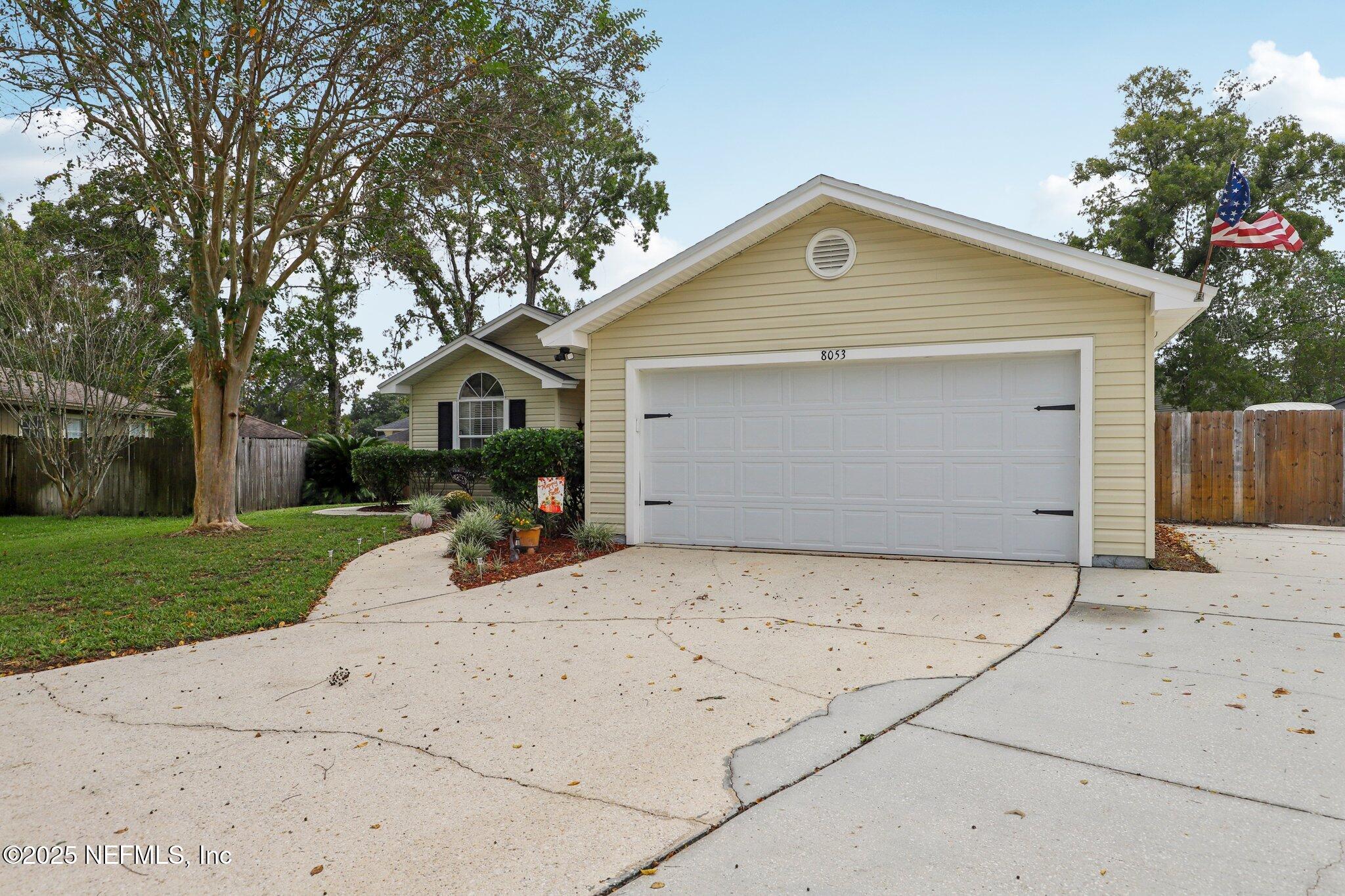 8053 Queensferry Lane Jacksonville, FL 32244 - Photo 44 of 45 a front view of house with yard and trees in the background